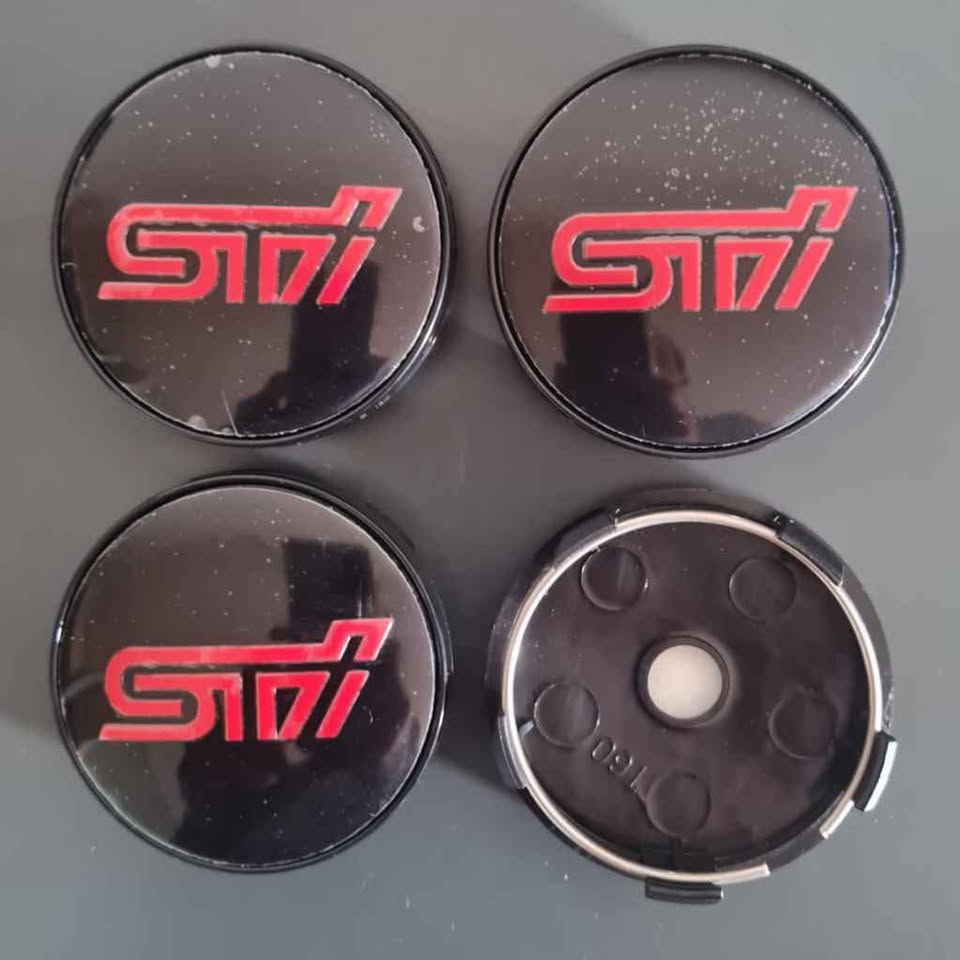 Subaru STI badges stickers wheel centre caps - Private Seller Subaru STI badges stickers wheel centre caps - Private Seller