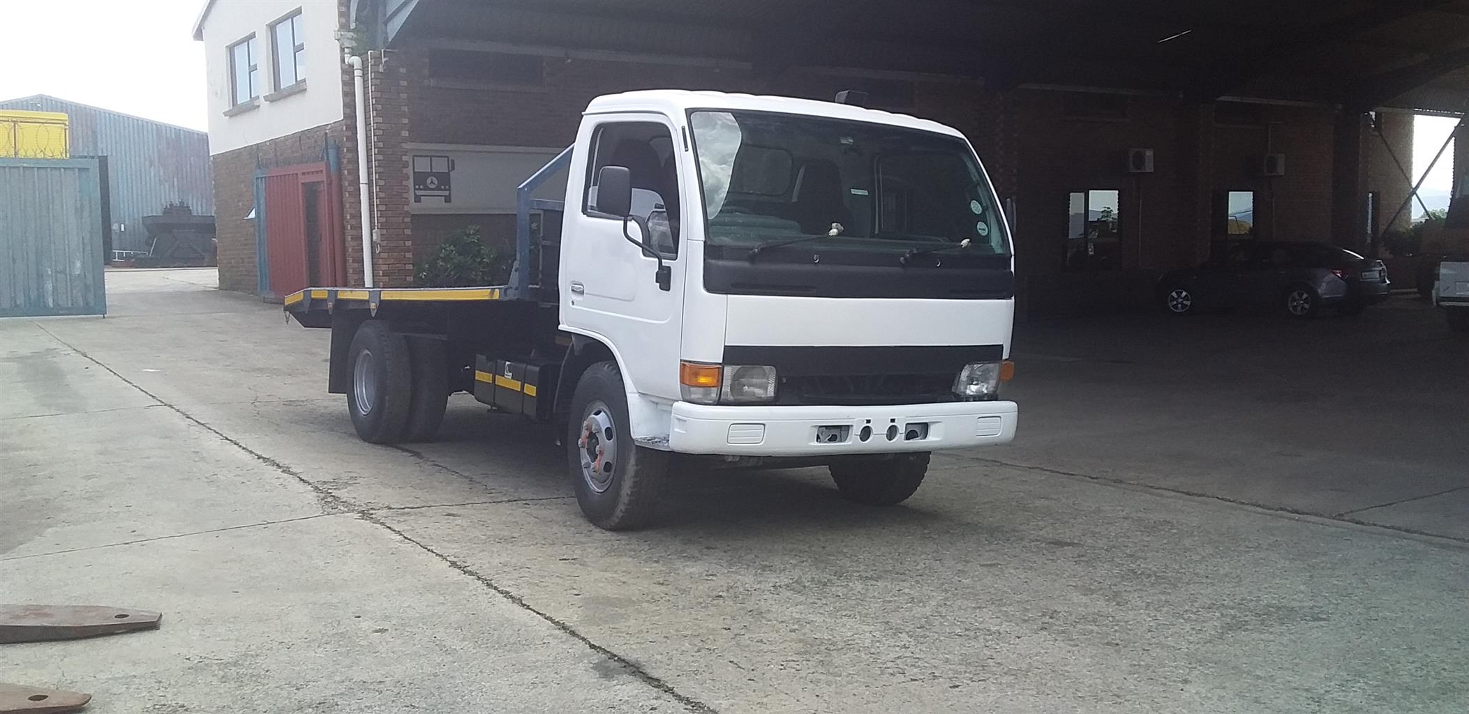 2002 NISSAN DIESEL UD40 WITH VEHICLE CARRIA BODY & TRAILER | Junk Mail ...