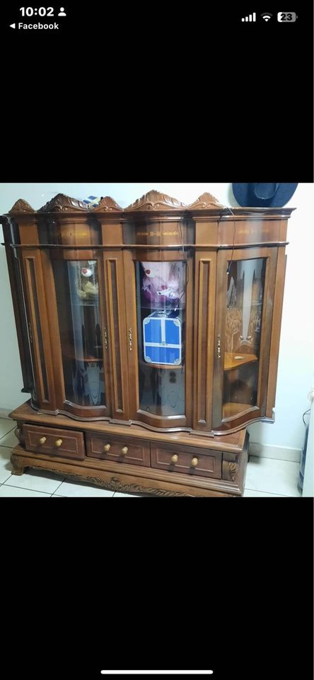 Display cabinet  Antique for both.It doesn’t come with ornaments  Whatsapp