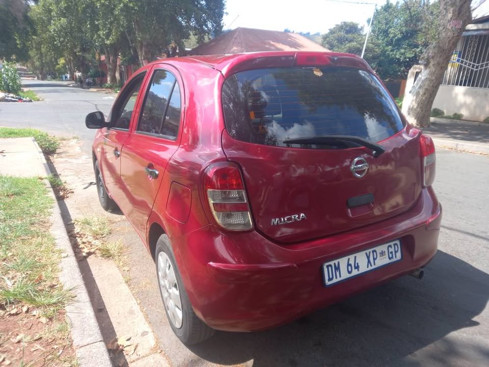 2015 Nissan Micra 1.2 Petrol, Manual, Maroon Color, Mileage 176000km Spare key.