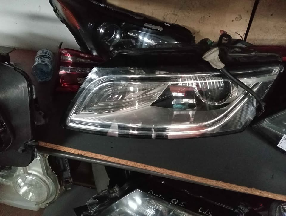 Audi Q5 Headlight  Used Auto Body Spare Parts at Sema Spare Center. Affordable - Private Seller