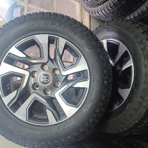 Toyota fortuna rims and general grabber at3