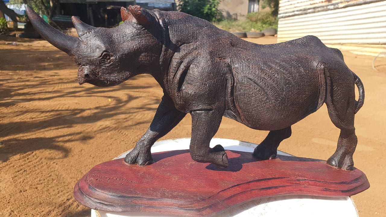 Fine art,wildlife carvings,on Ironwood
