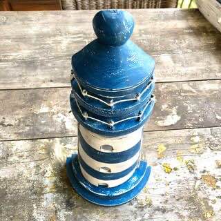 Lighthouse key holder that will bring a nautical flair to your decor.