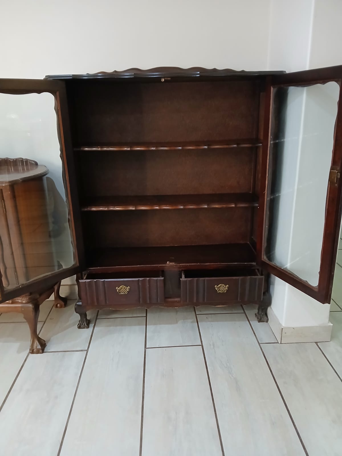 Antique Ball and claw display cabinet