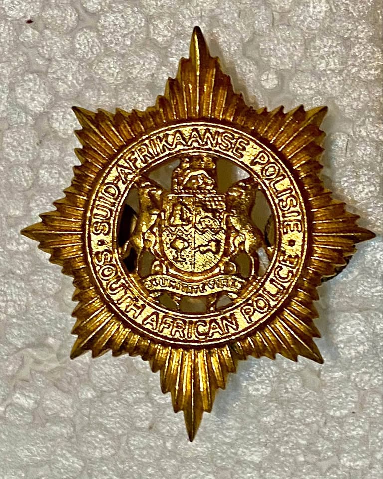 Vintage brass South African Police pin