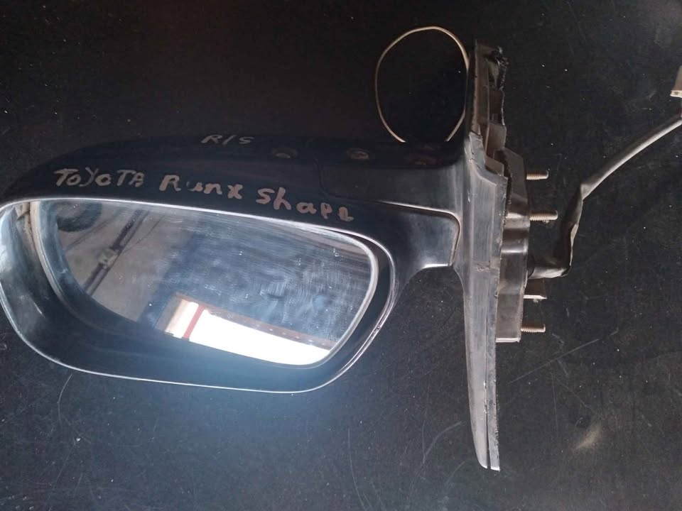 Toyota corolla runx shape right side door mirror for sale please contact us for more details - Private Seller