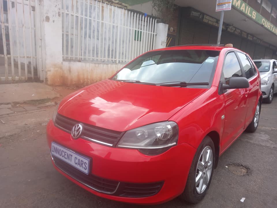 2012 VW POLO VIVO 1.4 TRENDLINE PETROL, RED COLOUR, MILEAGE . HAS SUNROOF.