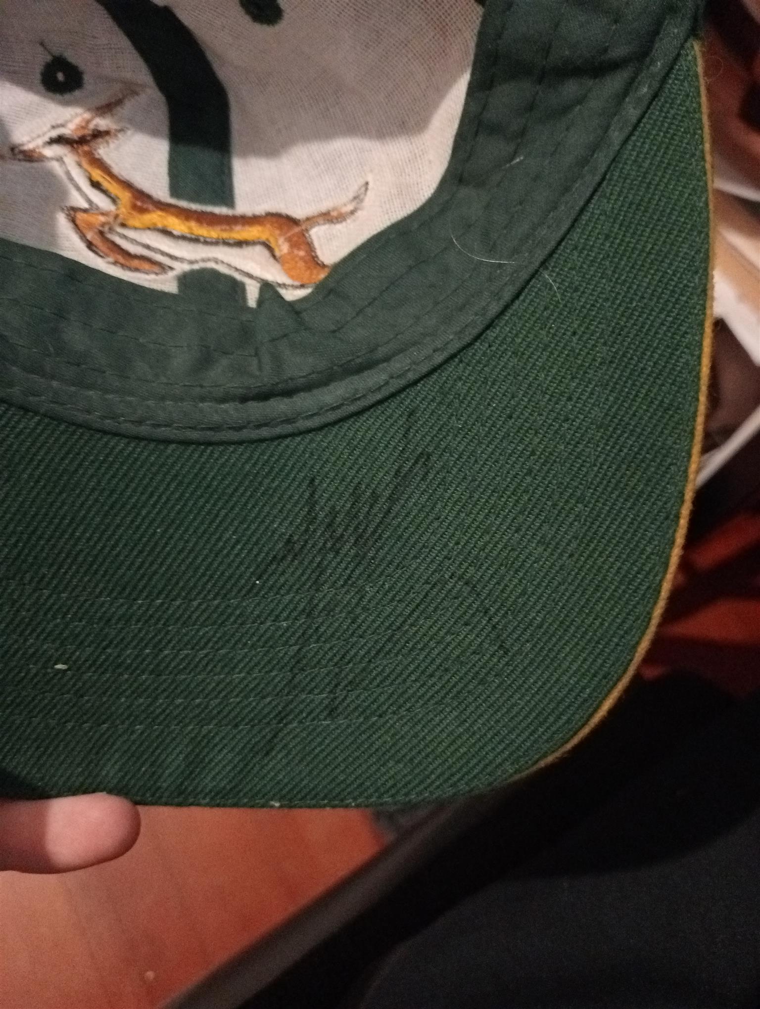 A cap signed by the springbok rugby team.
