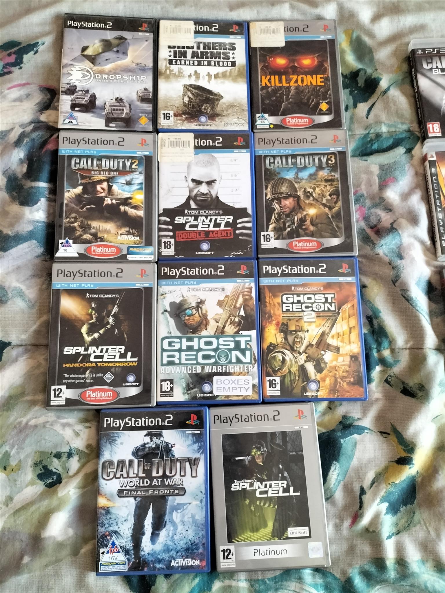 Ps3 and Ps2 with lots of games for sale 