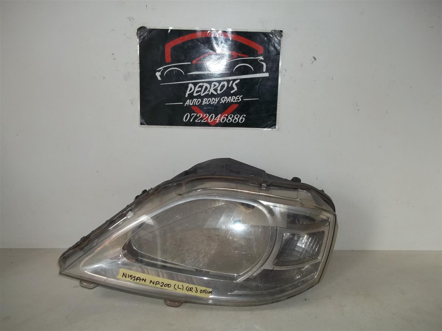 Nissan NP200 '08+ left headlight - Private Seller Nissan NP200 '08+ left headlight - Private Seller