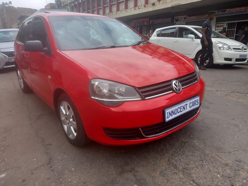 2012 VW POLO VIVO 1.4 TRENDLINE PETROL, RED COLOUR, MILEAGE . HAS SUNROOF.