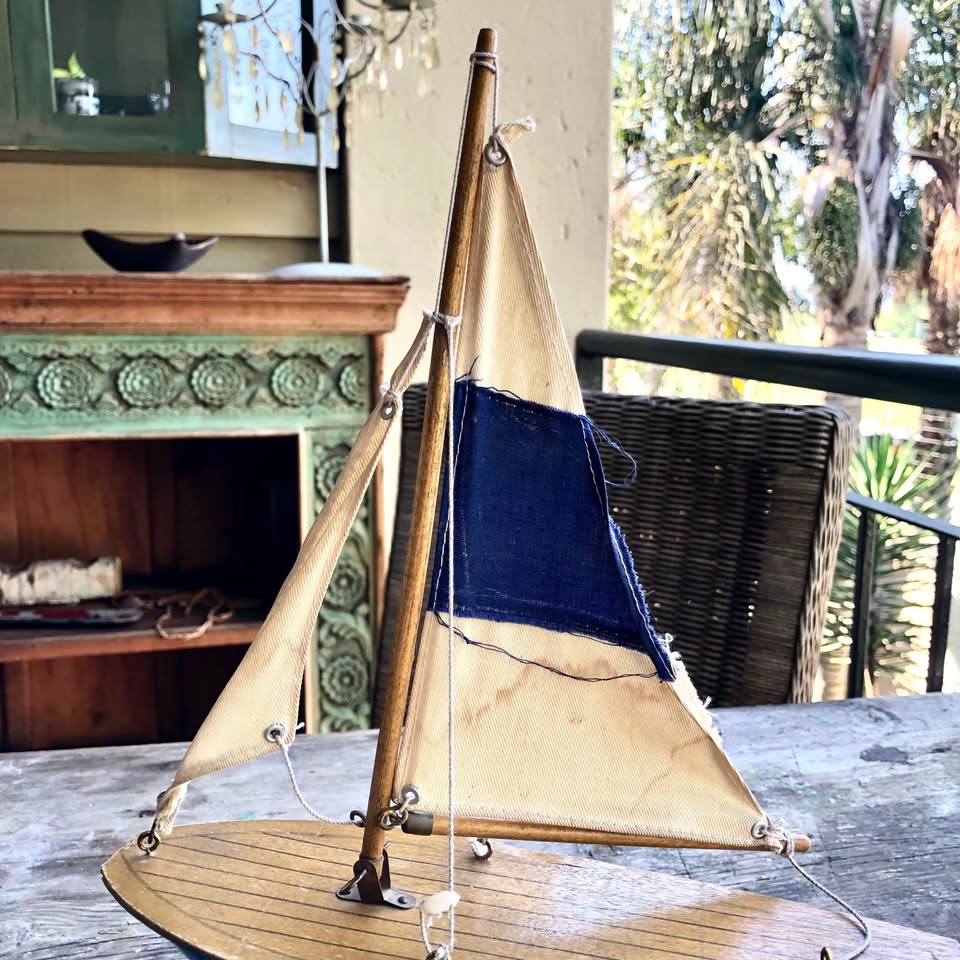 Vintage Decorative Sailing Boat on a wooden stand.