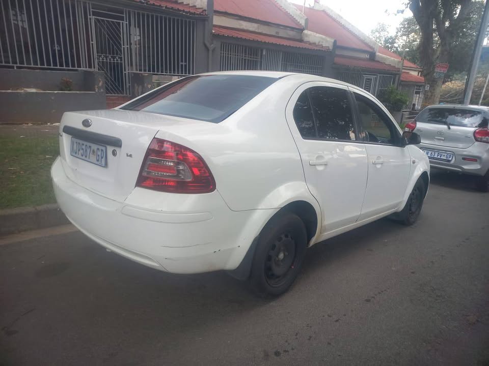 Ford Ikon Sedan 2009 Model 1.4 Engine Petrol, Manual Transmission, White Color, Mileage