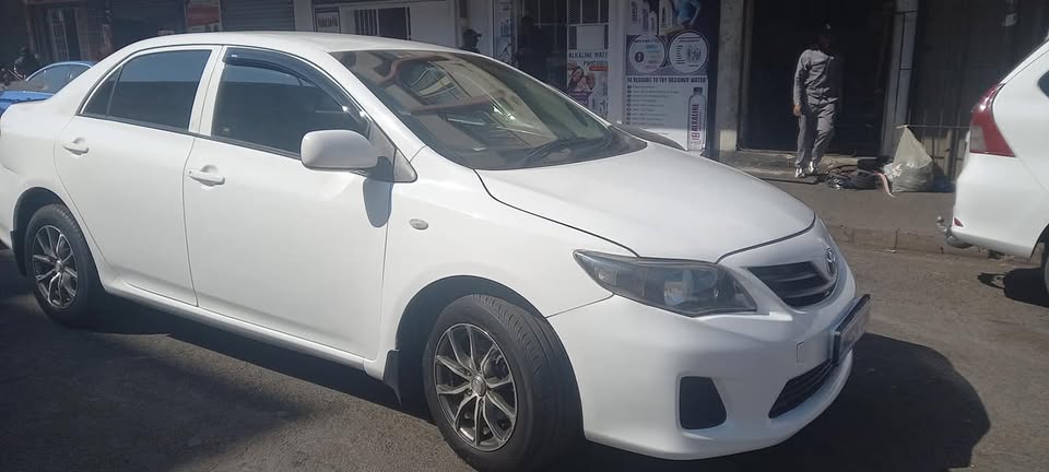 2016 TOYOTA COROLLA QUEST 1.6 ENGINE, MANUAL TRANSMISSION, WHITE COLOUR