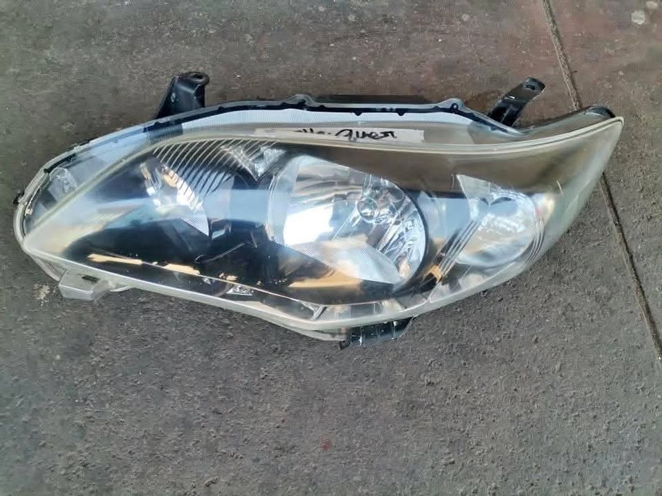 Nice Toyota Corolla QUEST Headlight Left Side. At Sema Spare Centre - Private Seller