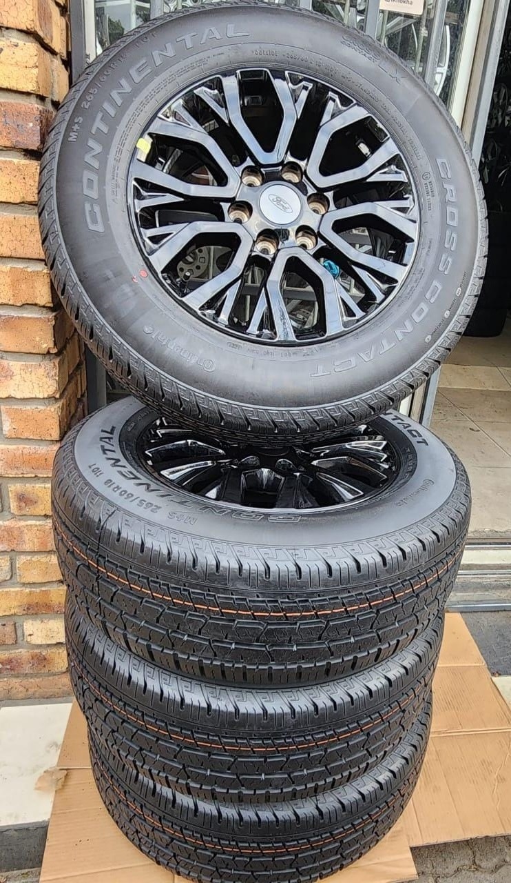 18" Ford Stormtrack/Thunder original mags with brand new 265/60/18 Continental C - Private Seller 18" Ford Stormtrack/Thunder original mags with brand new 265/60/18 Continental C - Private Seller