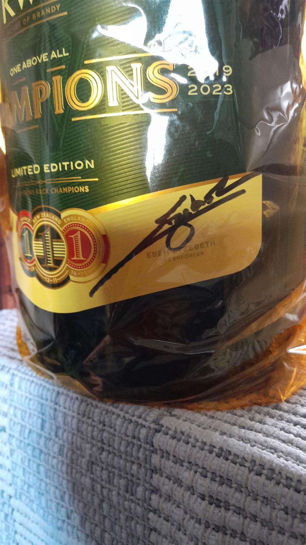 Limited Champions Edition.5year old KWV Bottle signed by Eben Etzabeth.Collector