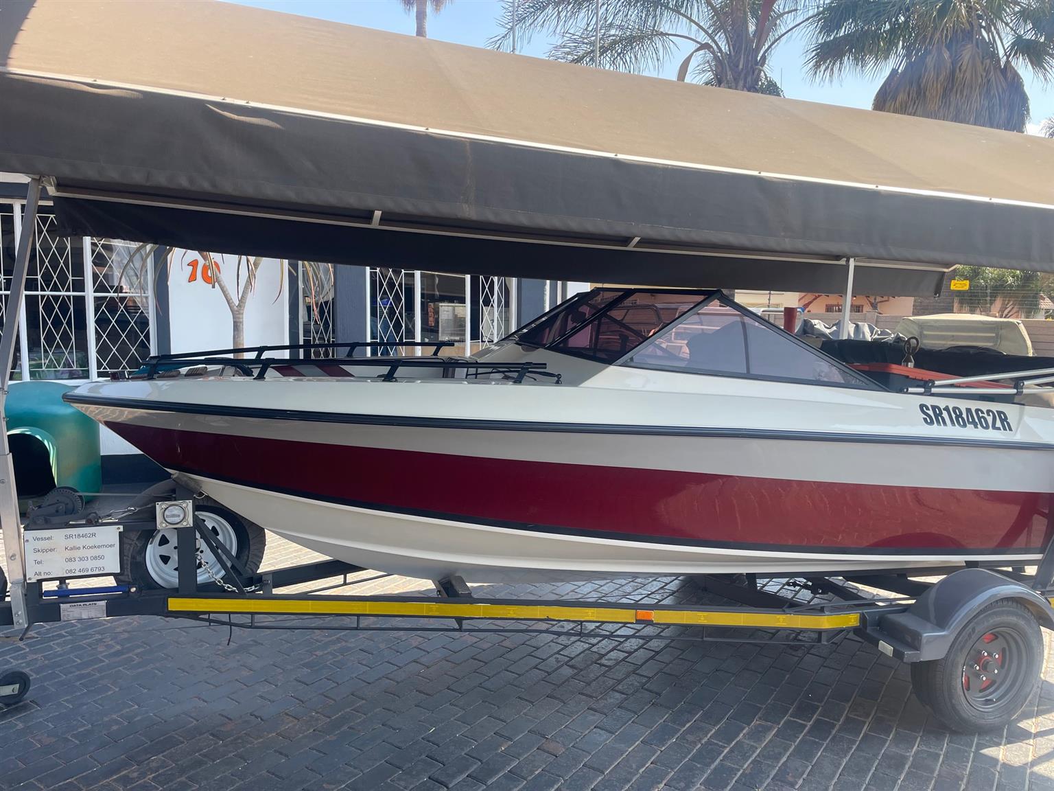 Antiqua ski boat