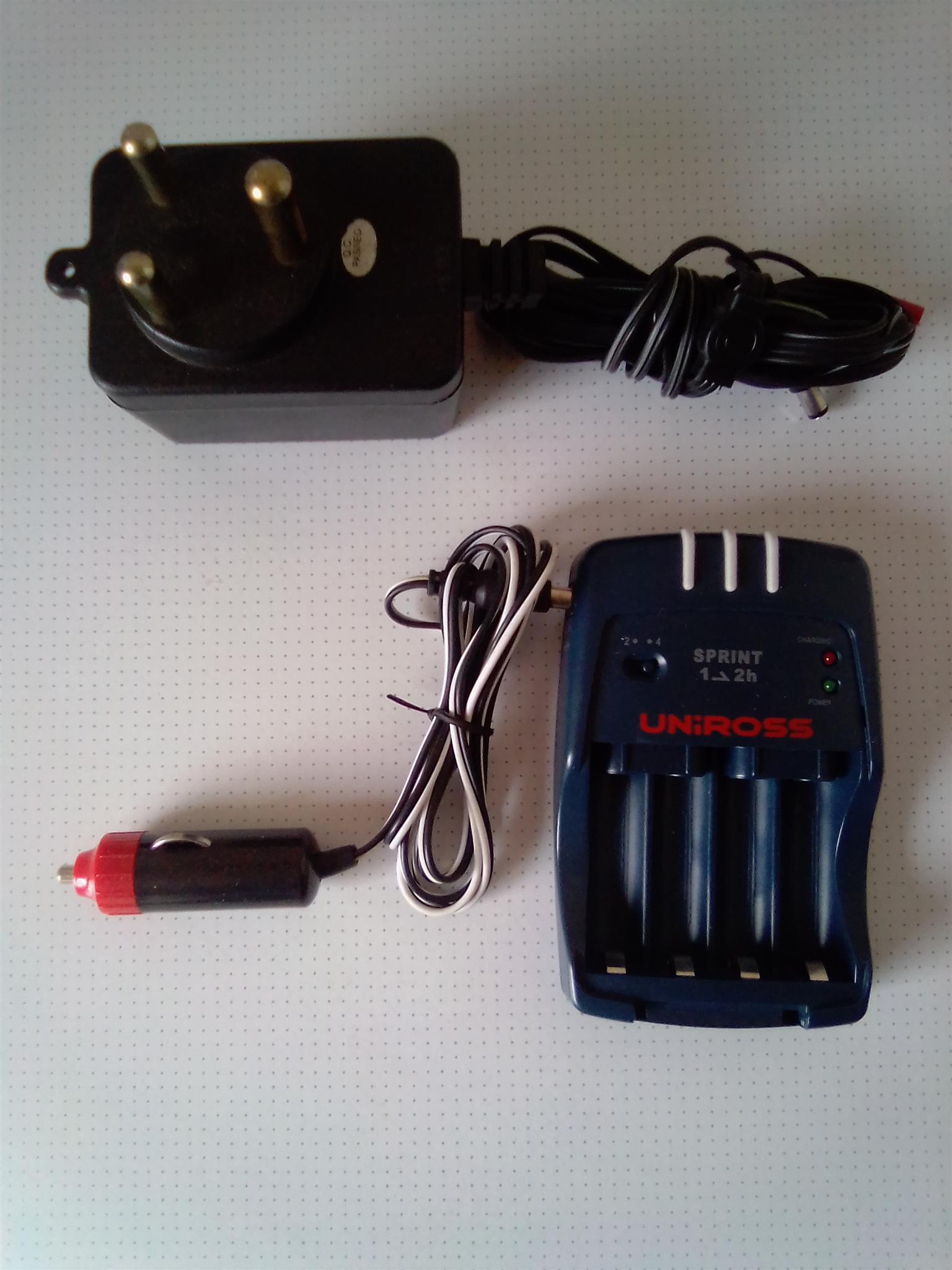 Charger for AA and AAA Batteries. Works on 220V and 12V.