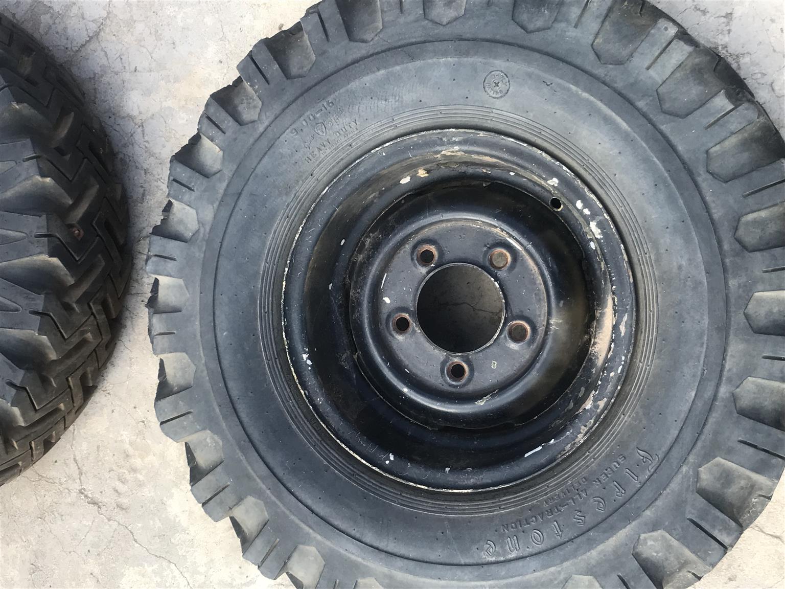 Heavy duty tires with a rim,all traction extra grip ,good condition (6) - Private Seller