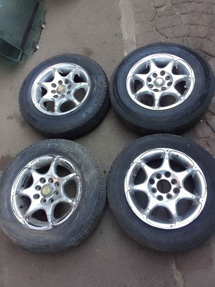 Mazda 323 rims n tyer size 13 inche for sale - Private Seller Mazda 323 rims n tyer size 13 inche for sale - Private Seller