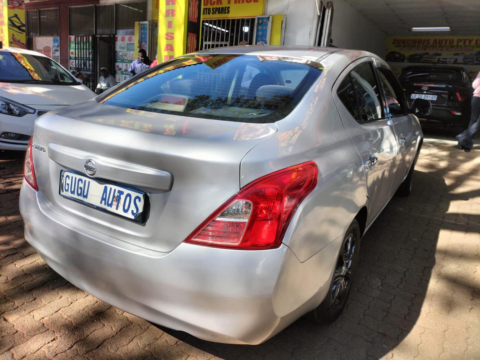 2015 Silver Nissan Almera sedan 1.5 Manual milage 86,000 km petrol