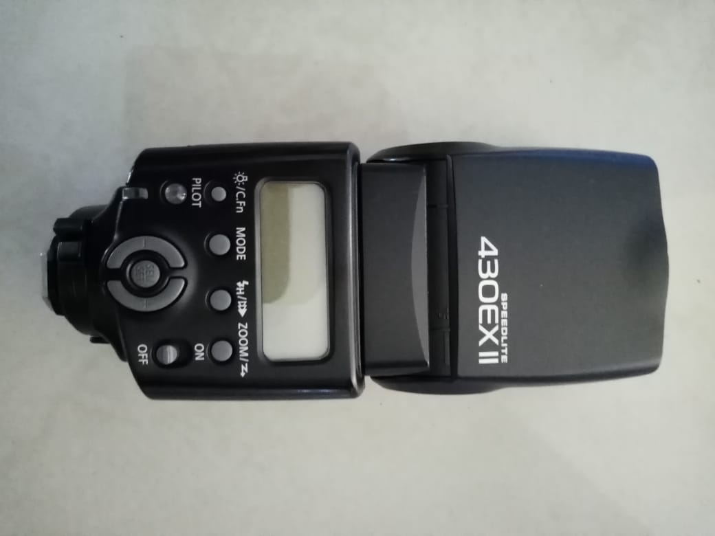 Canon Digital SLR Camera, Speedlite Flash and Manfrotto Tripod