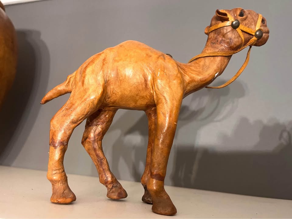 Two small leather camels