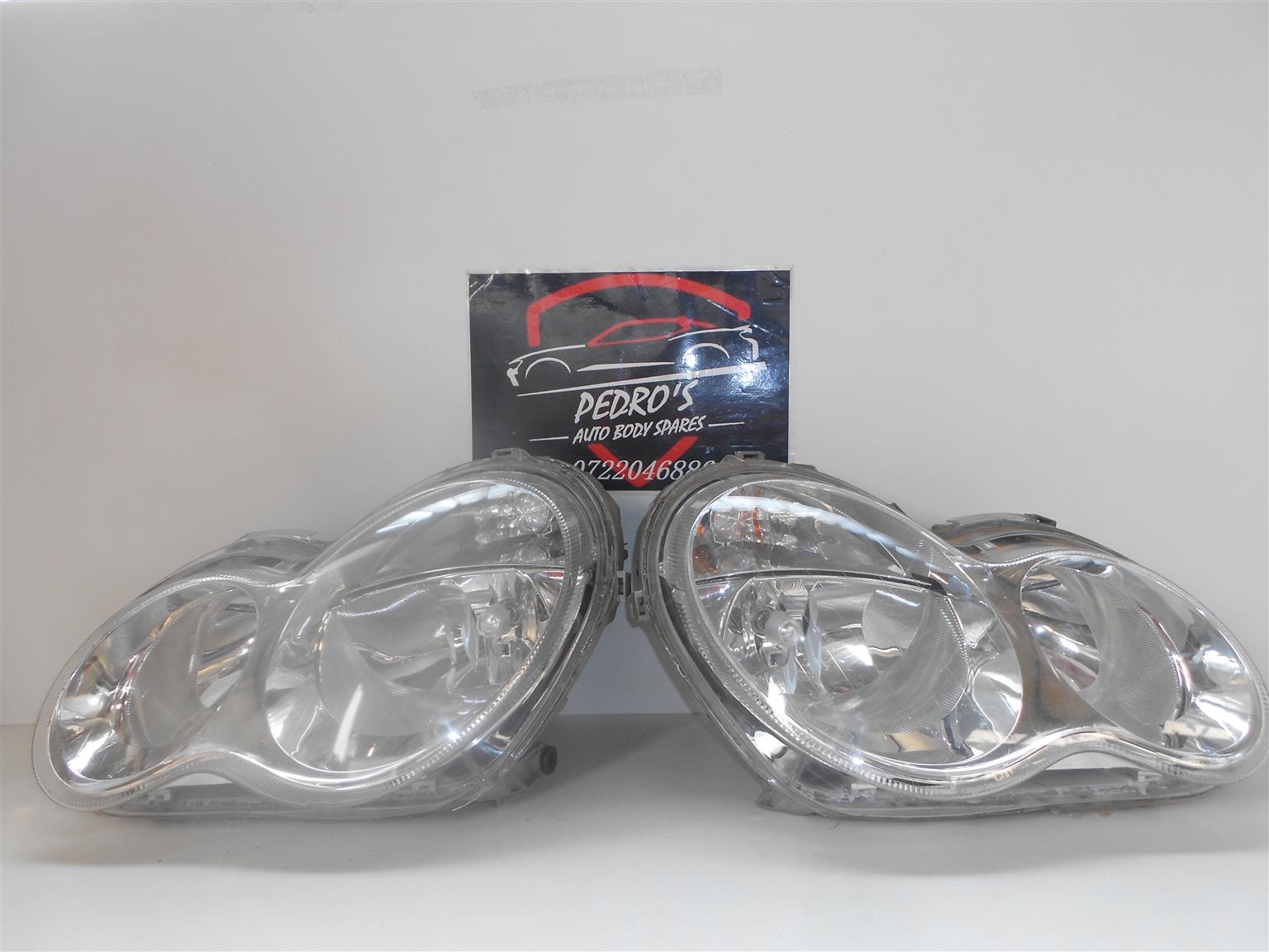 Merc W203 normal headlight set - Private Seller Merc W203 normal headlight set - Private Seller