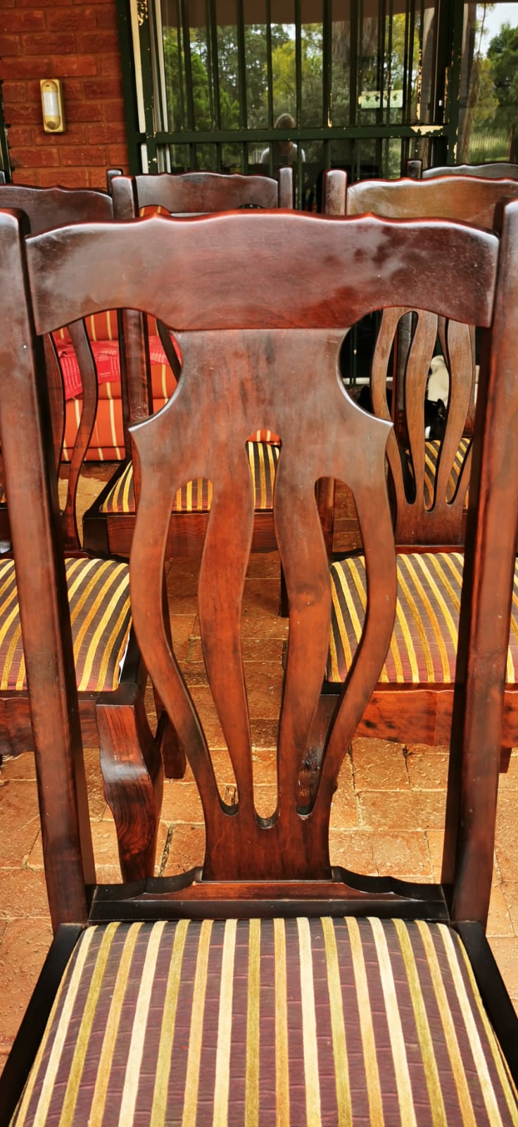 Solid wood, Chippendale type dining room chairs in Ball and claw design.