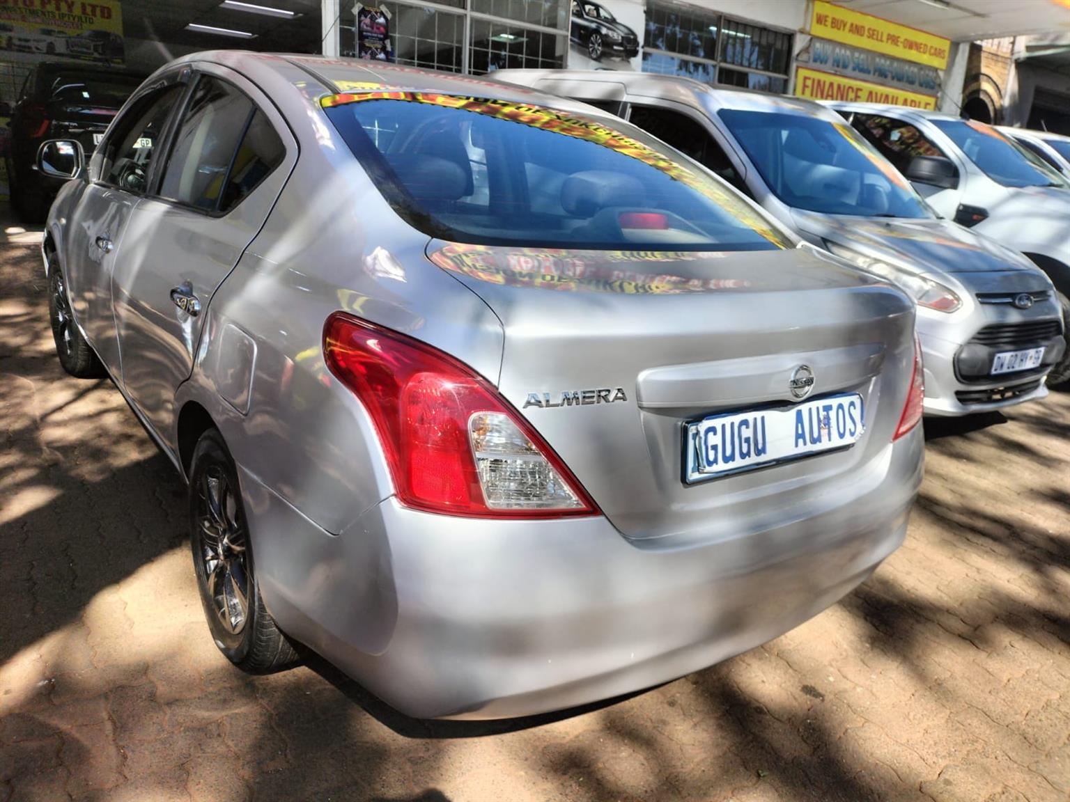 2015 Silver Nissan Almera sedan 1.5 Manual milage 86,000 km petrol
