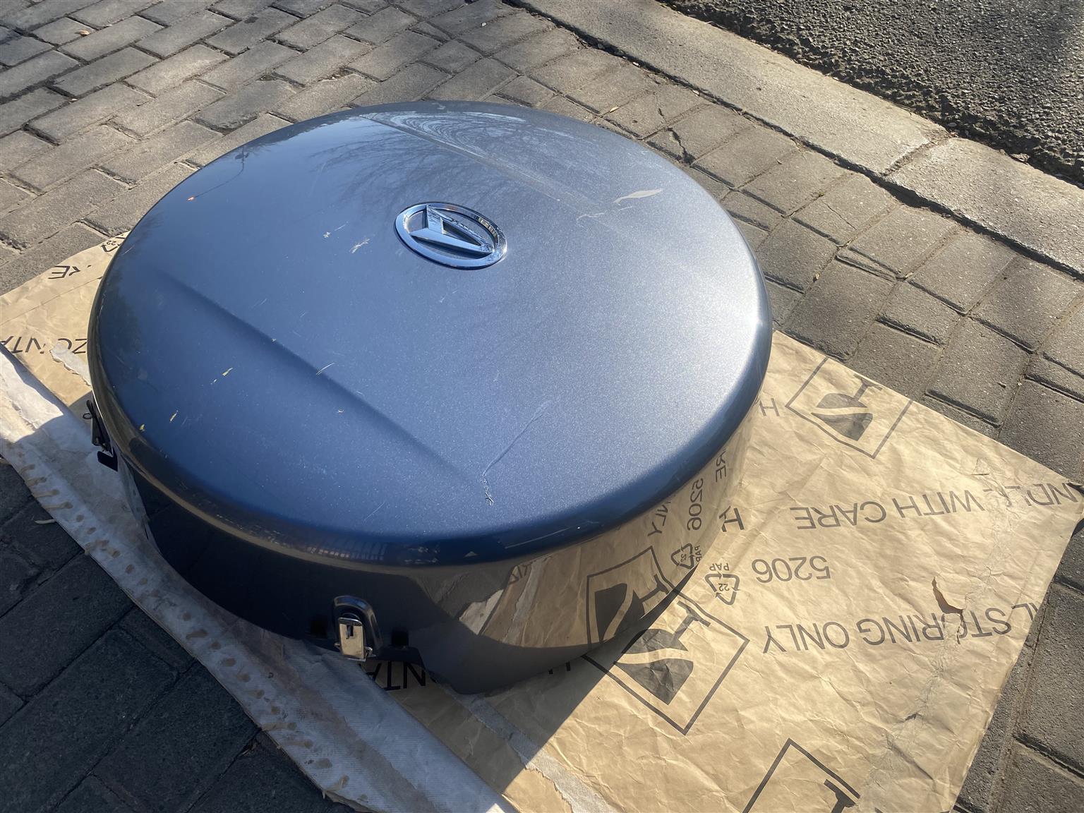 2010 DAIHATSU TERIOS COMPLETE SPARE WHEEL COVER FOR SALE. IN PRISTINE CONDITION