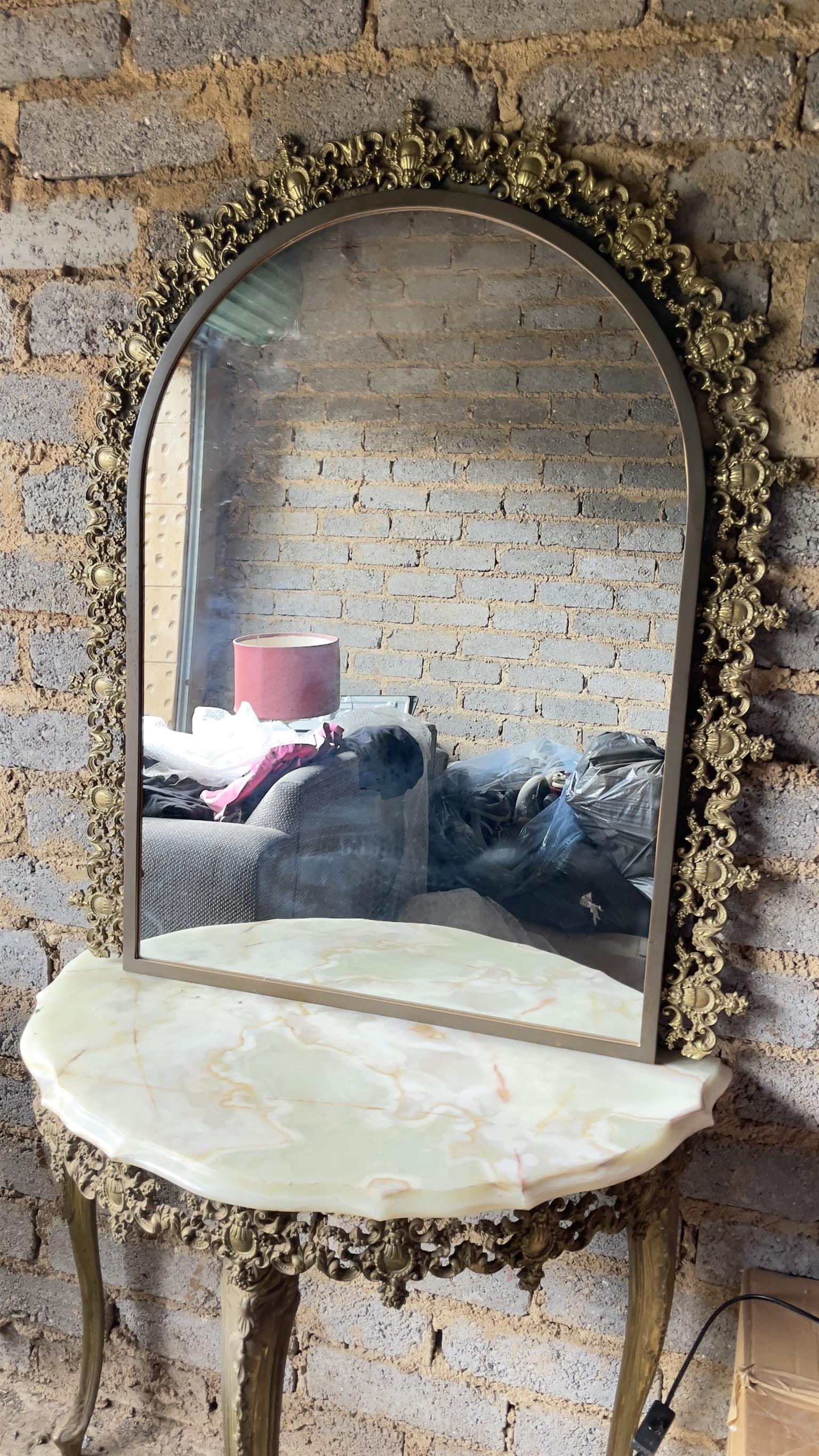 Stunning ornate moulded brass wall mirror and half moon marble table