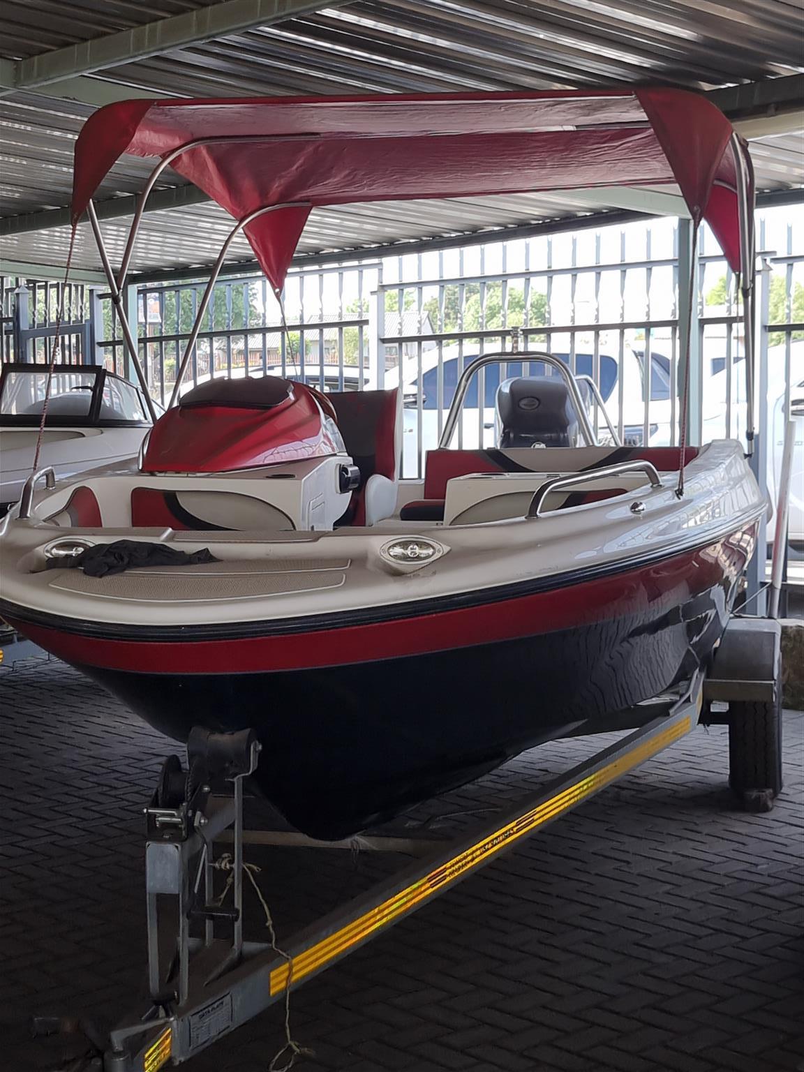 18 ft Exspression Funster boat with 150 Optimax Murcury Motor