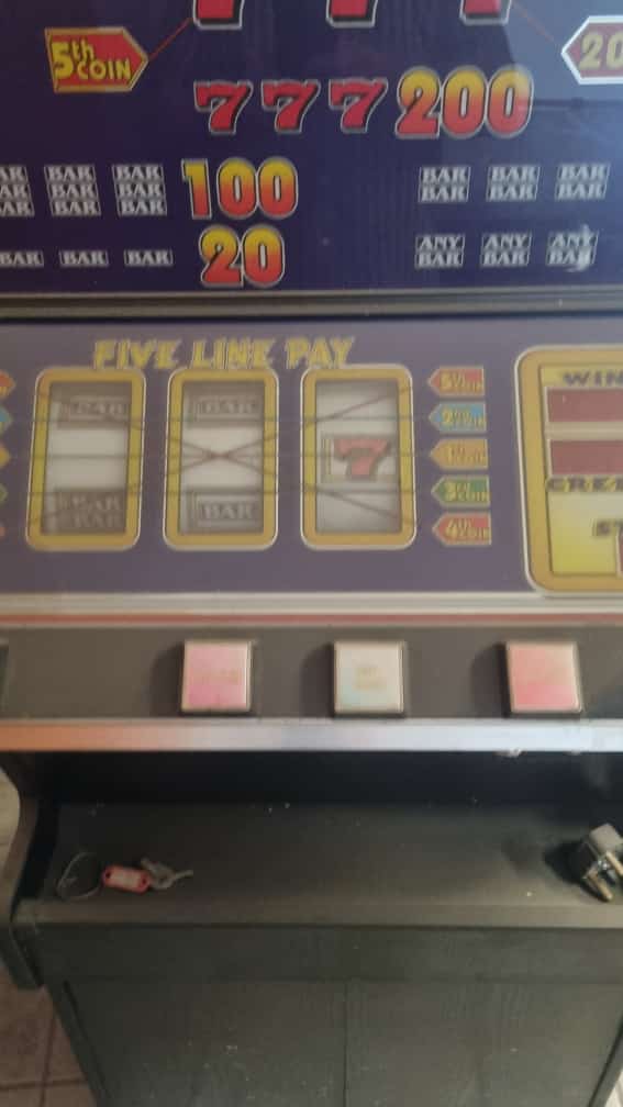 Unrestored Slot Machine -