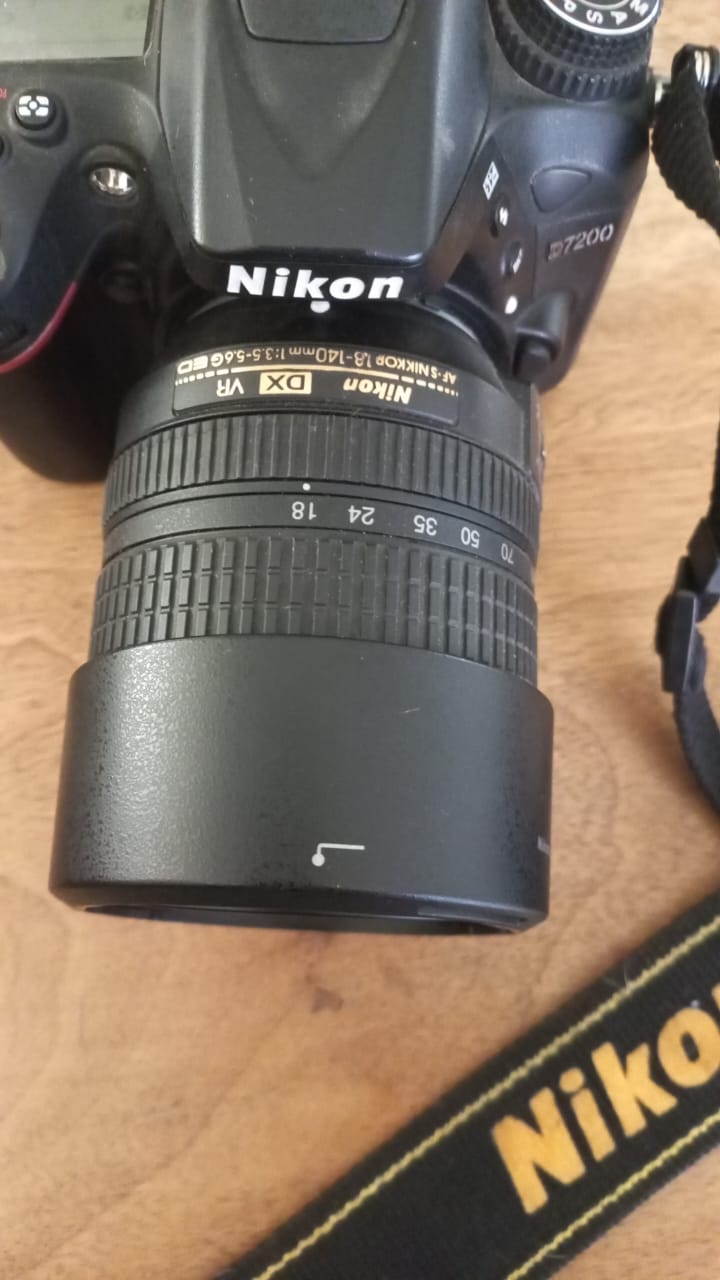 Nikon camera with lenses and battery pack