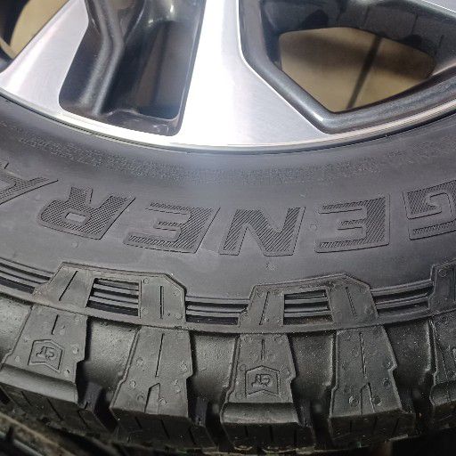 Toyota fortuna rims and general grabber at3