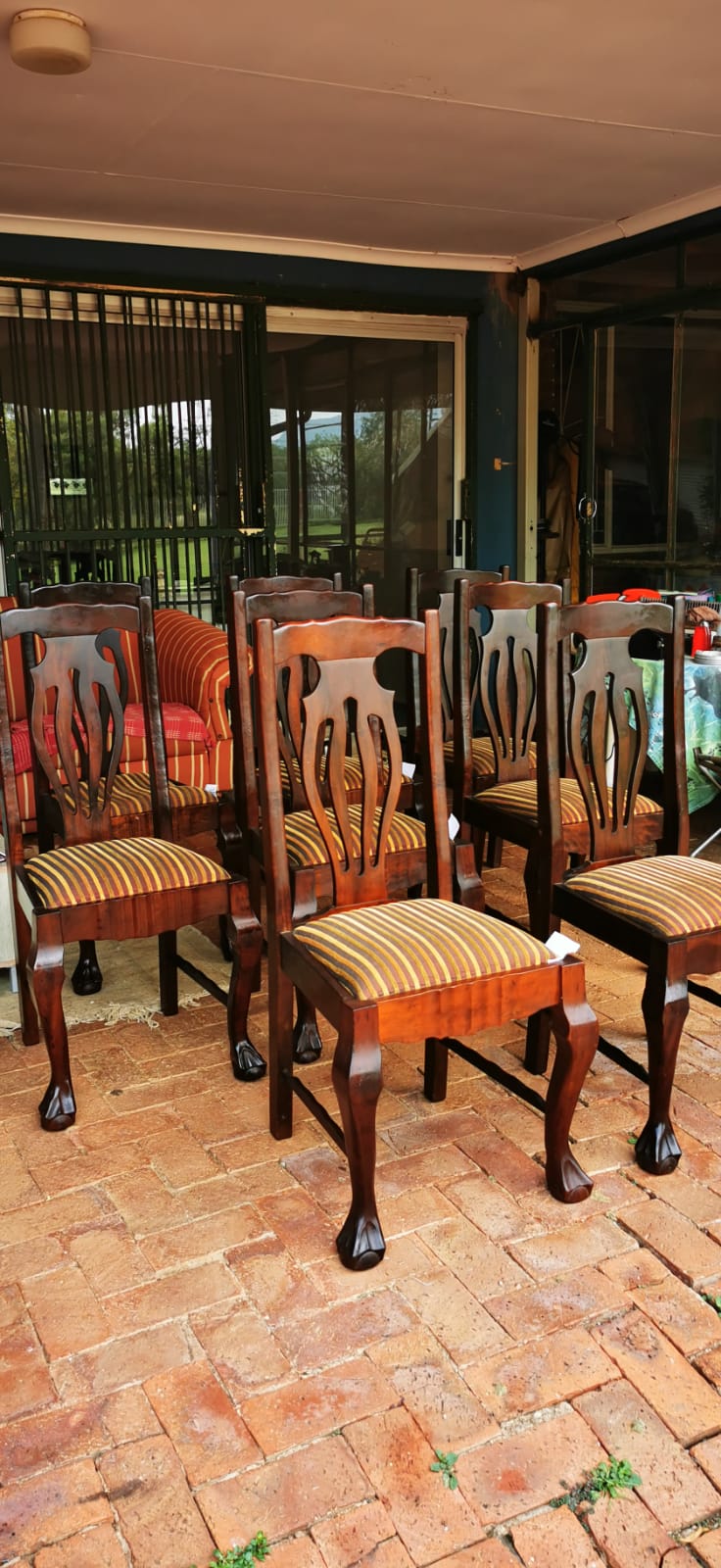 Solid wood, Chippendale type dining room chairs in Ball and claw design. Solid wood, Chippendale type dining room chairs in Ball and claw design.