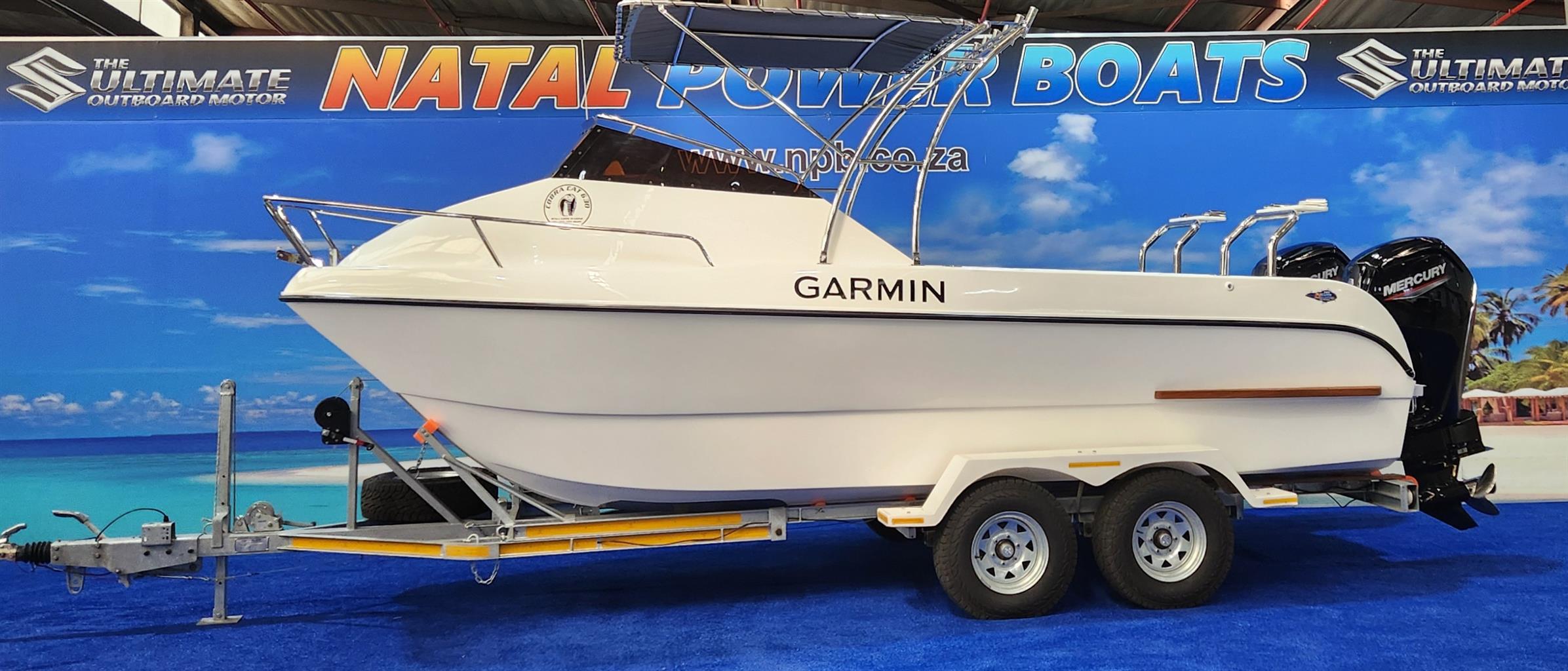 COBRA CAT 630 ON TRAILER 2 X 115 HP MERCURY CT 4 STROKES