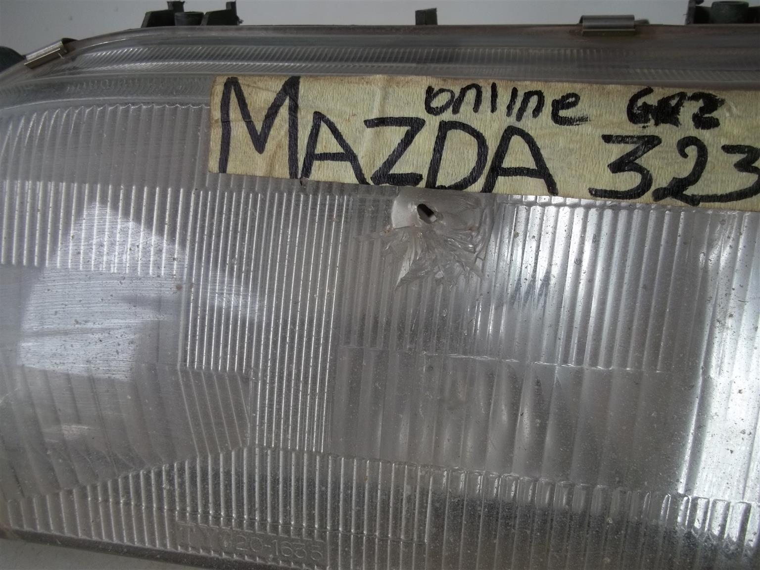 Mazda 323 '87-'04 left headlight - Private Seller