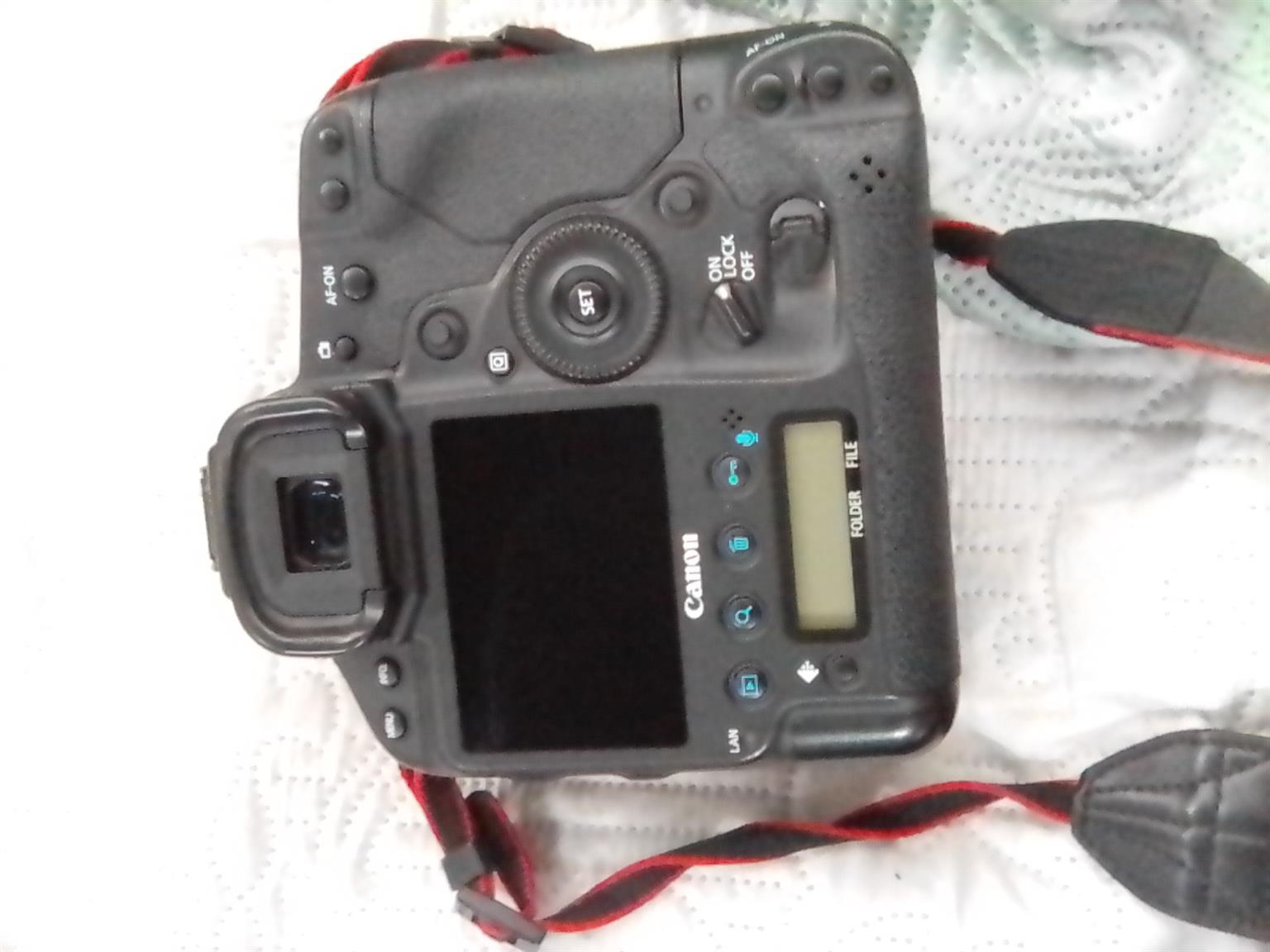 Canon 1DX camera with 2 batteries and chargers