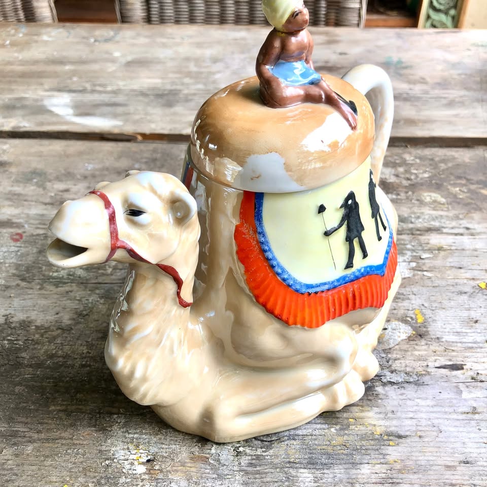 An Egyptian, very unique hand painted camel Teapot (please note condition)