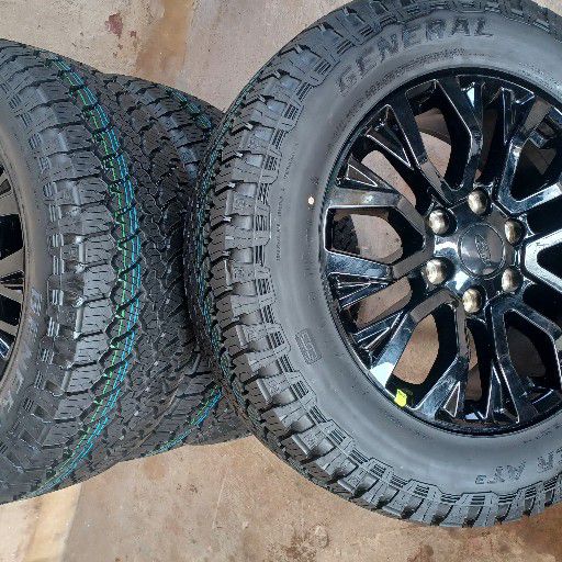 Ford thunder rims and general grabber at3 tyres