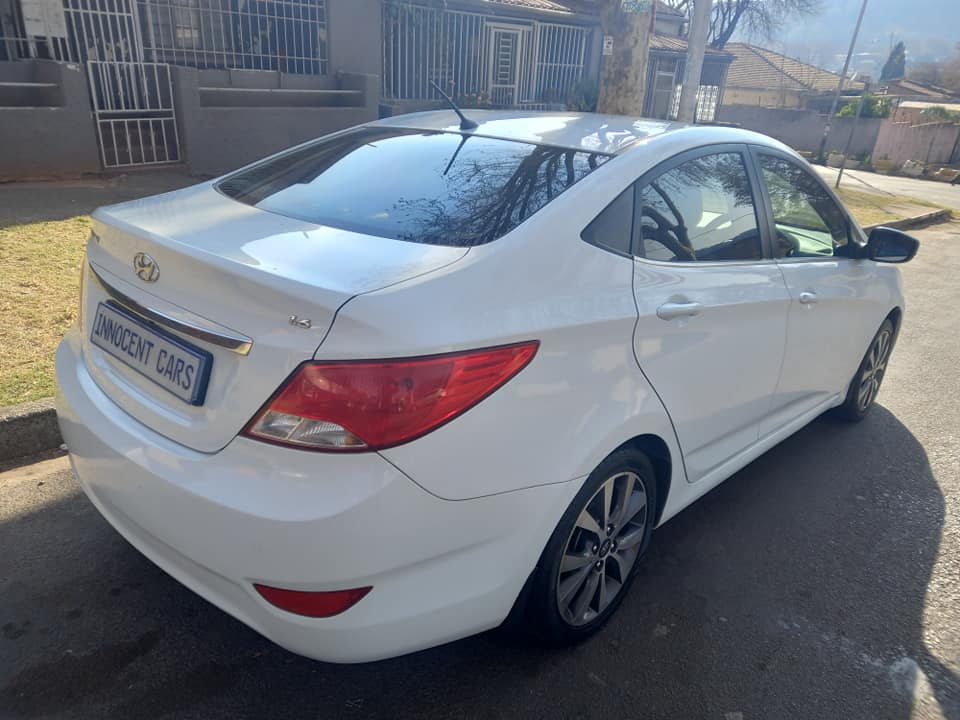 2017 HYUNDAI ACCENT SEDAN 1.6 ENGINE PETROL, MANUAL, WHITE COLOR, MILEAGE 68000KMS