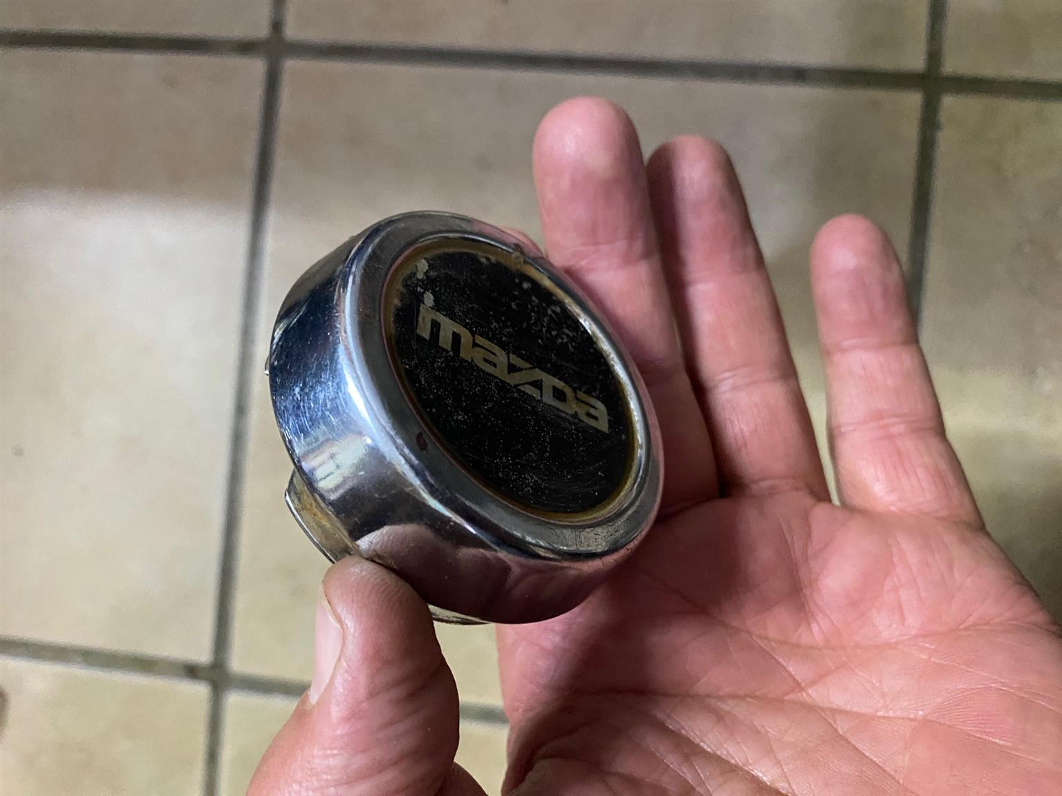 Mazda centre wheel cap for rim.