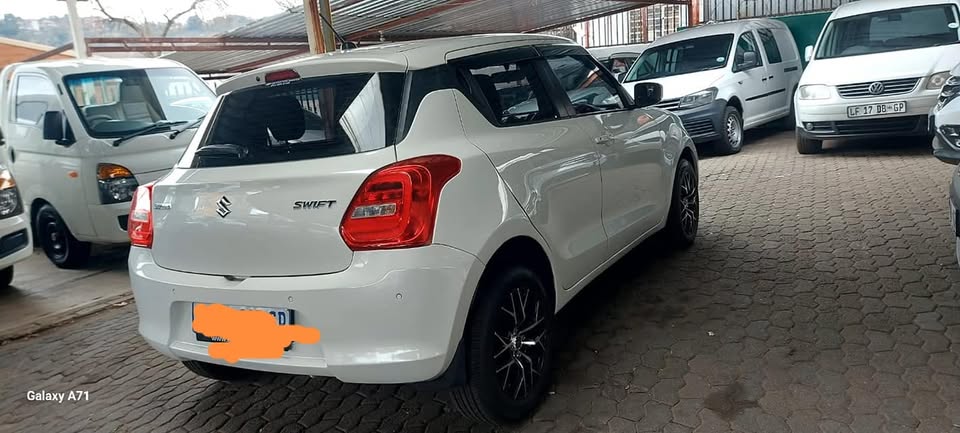 Suzuki Swift 1.2 GL manual petrol 2024 White Reverse sensor Service History