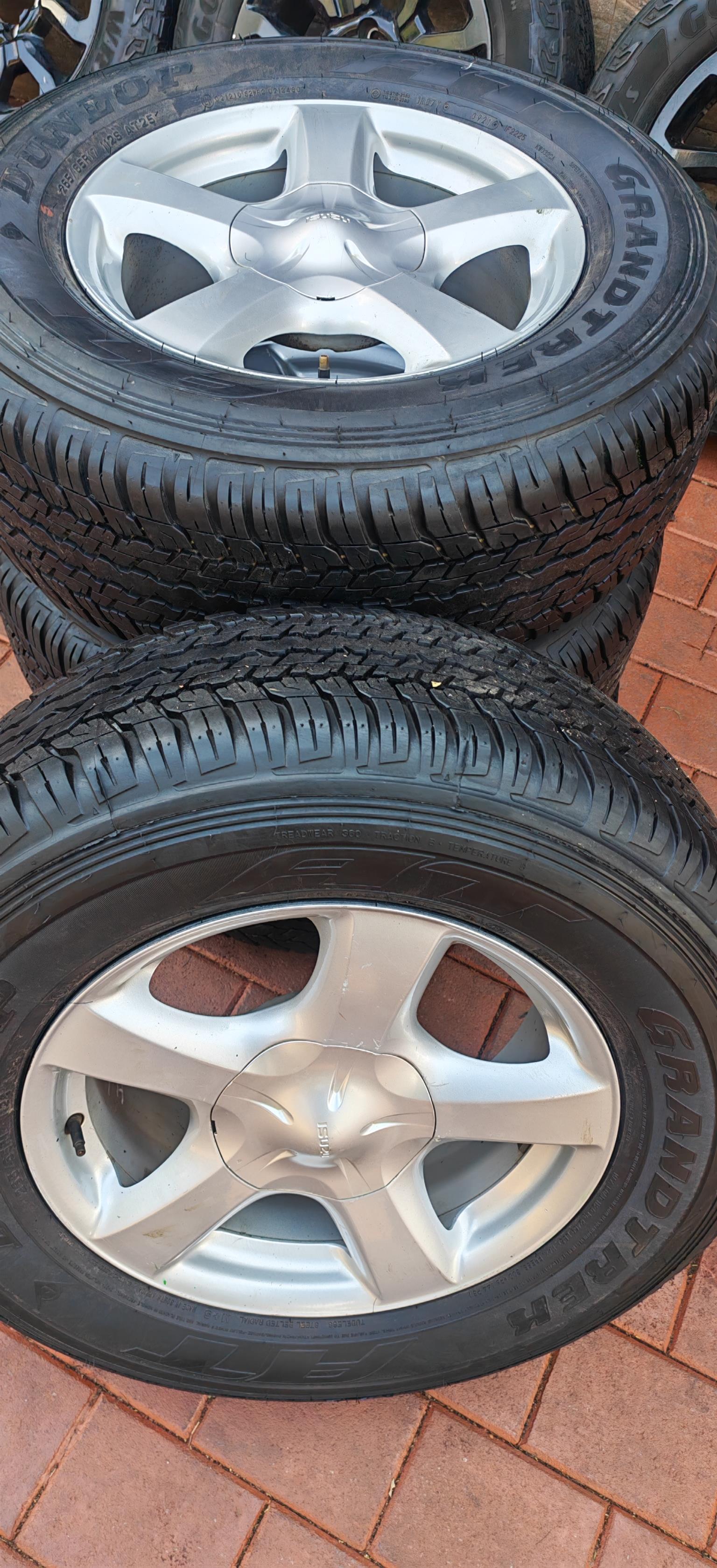 Isuzu wheels with dunlop grandtrek AT25 - Private Seller Isuzu wheels with dunlop grandtrek AT25 - Private Seller