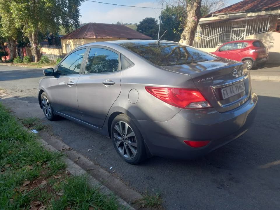 2017 HYUNDAI ACCENT SEDAN  1.6 FLUID PETROL, MANUAL, GREY, 77000kms