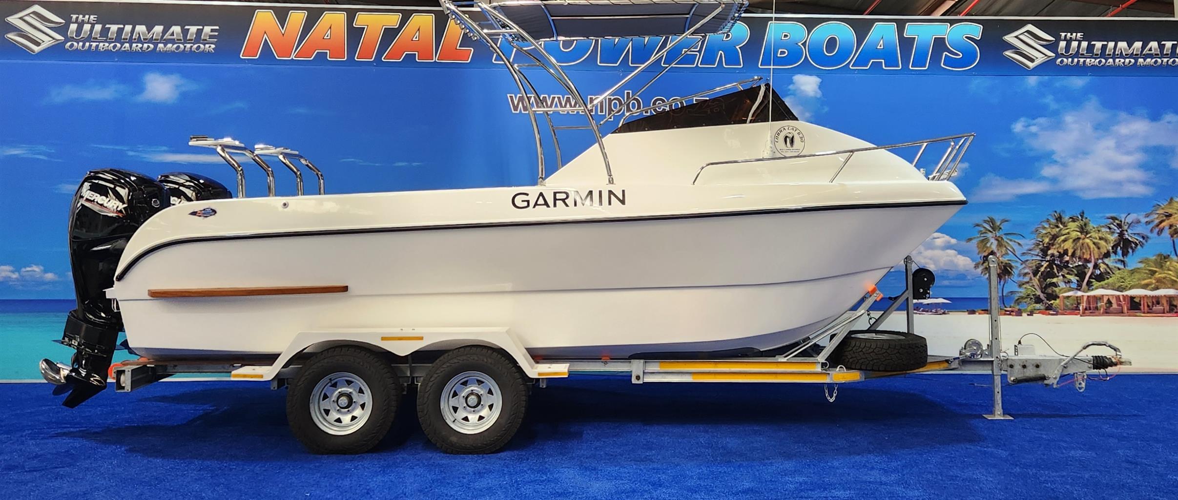COBRA CAT 630 ON TRAILER 2 X 115 HP MERCURY CT 4 STROKES